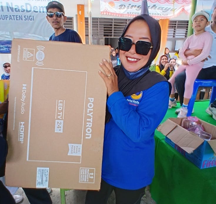 Rini, Peserta Jalan Santai NasDem Sigi Dapat Tv 24 Inch